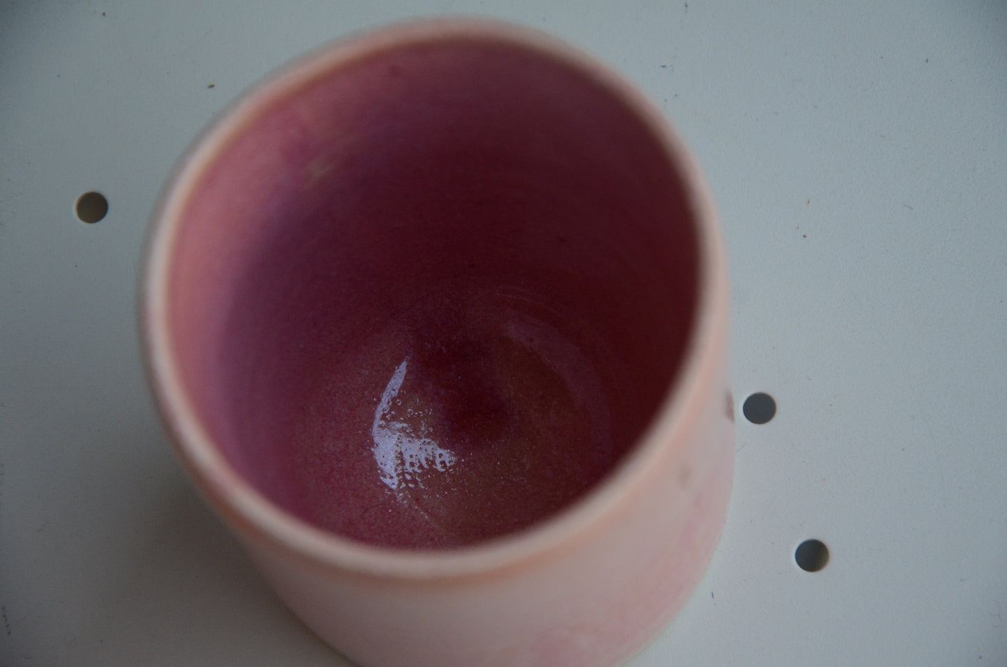 Pink cylindrical cup