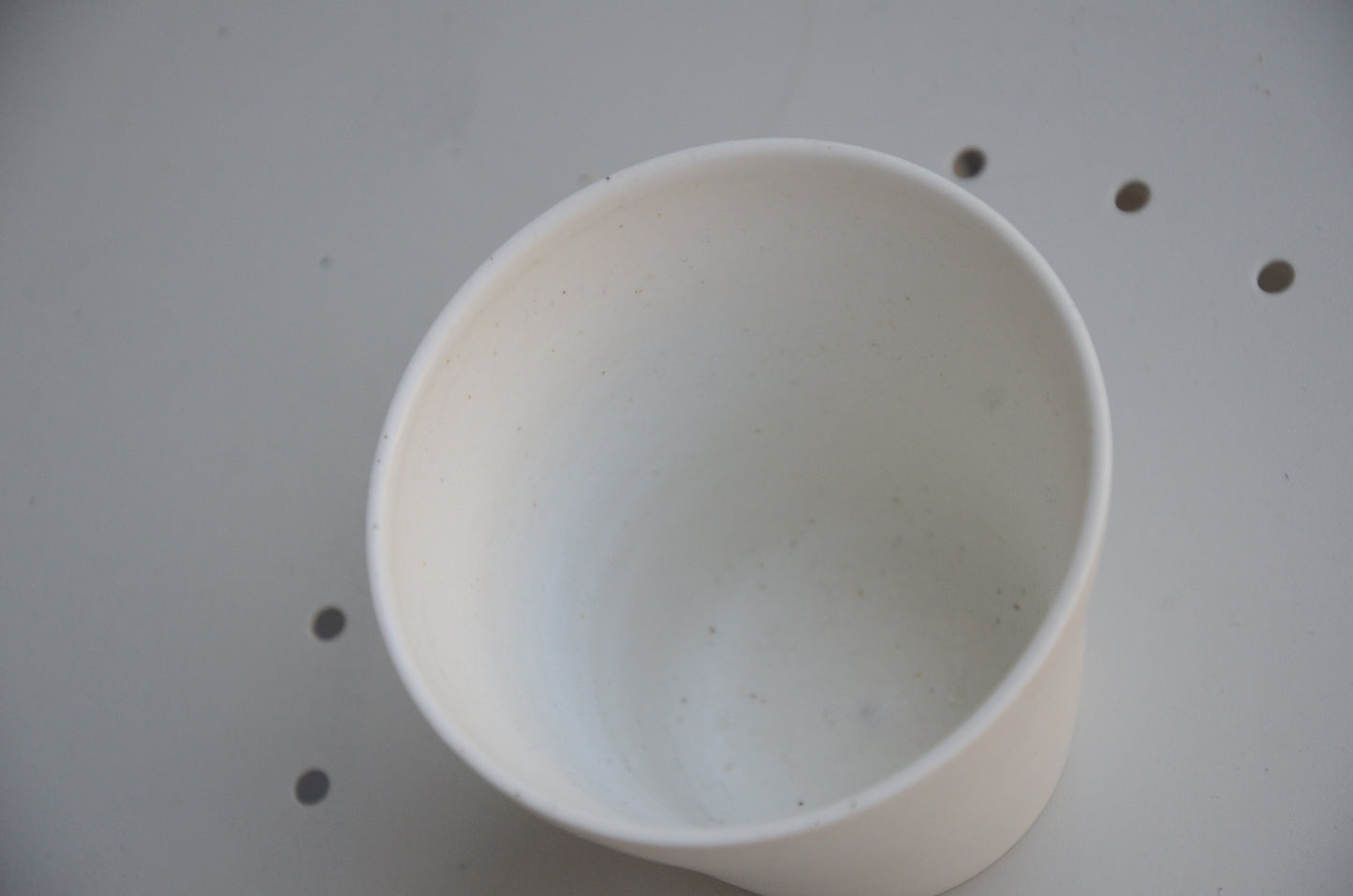 V-shaped porcelain cup