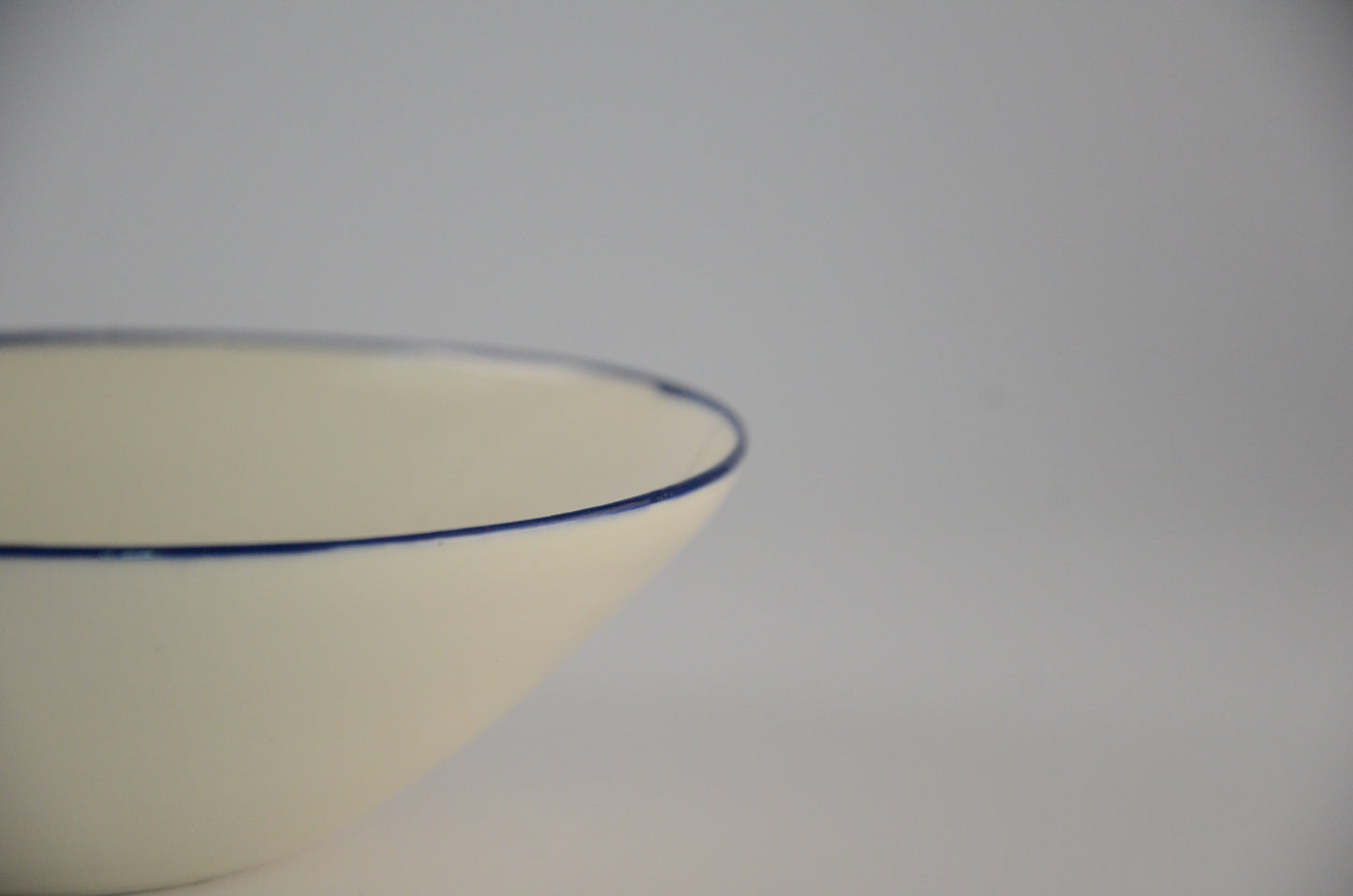 Navy blue rim porcelain bowel