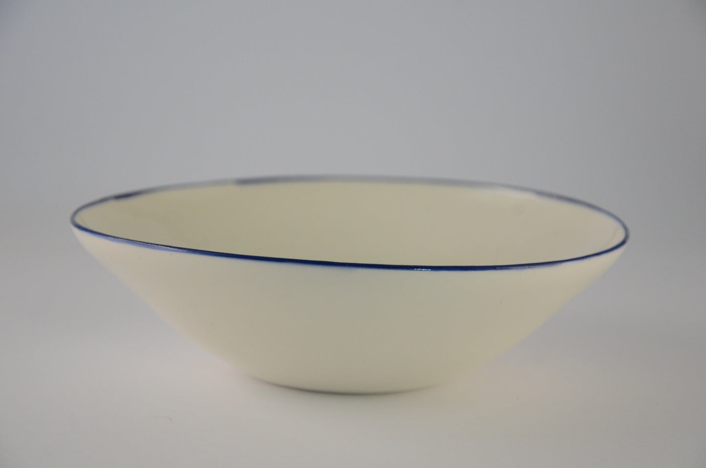 Navy blue rim porcelain bowel