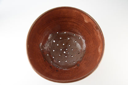 Red ceramic strainer