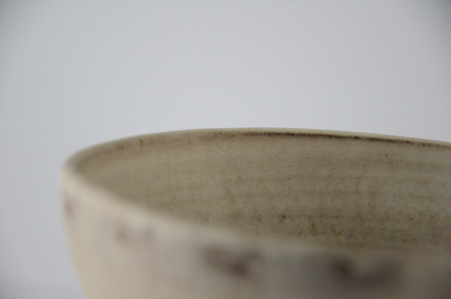 White ceramic strainer