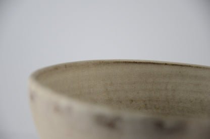 White ceramic strainer