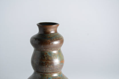 Tiered long neck vase