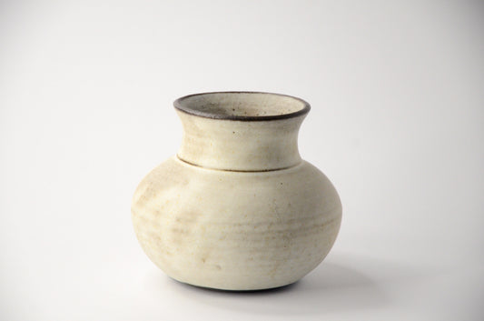 Circular white vase