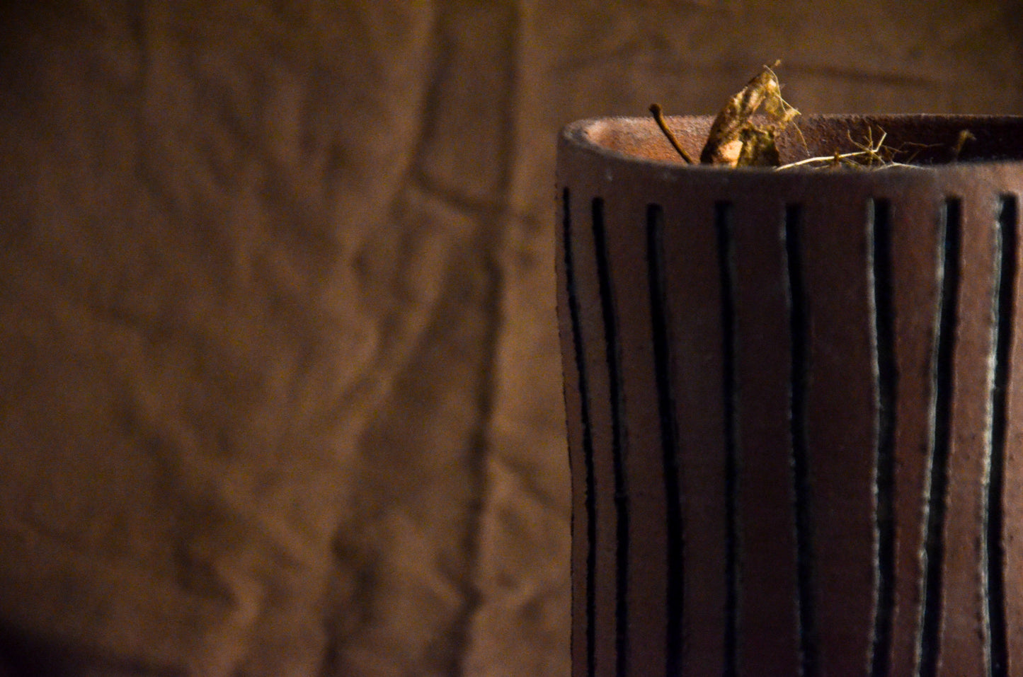 Brown cylinder textured planter