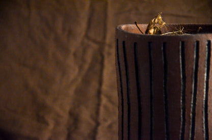 Brown cylinder textured planter