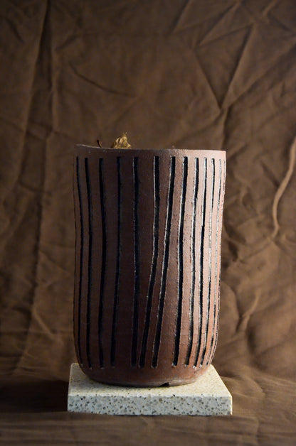 Brown cylinder textured planter