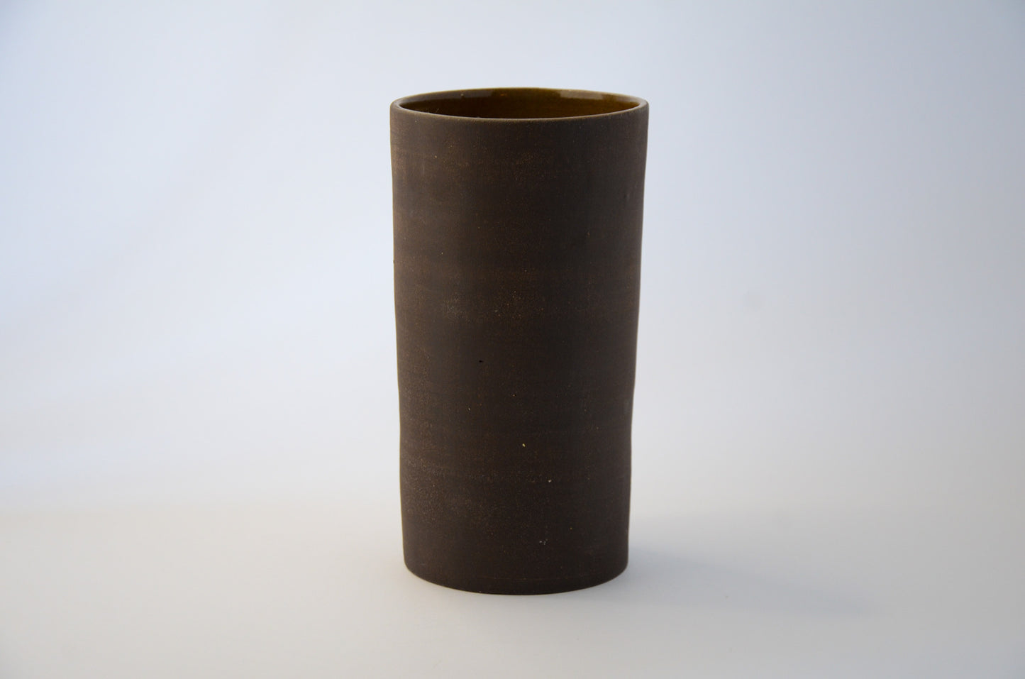 Cylindrical black vase